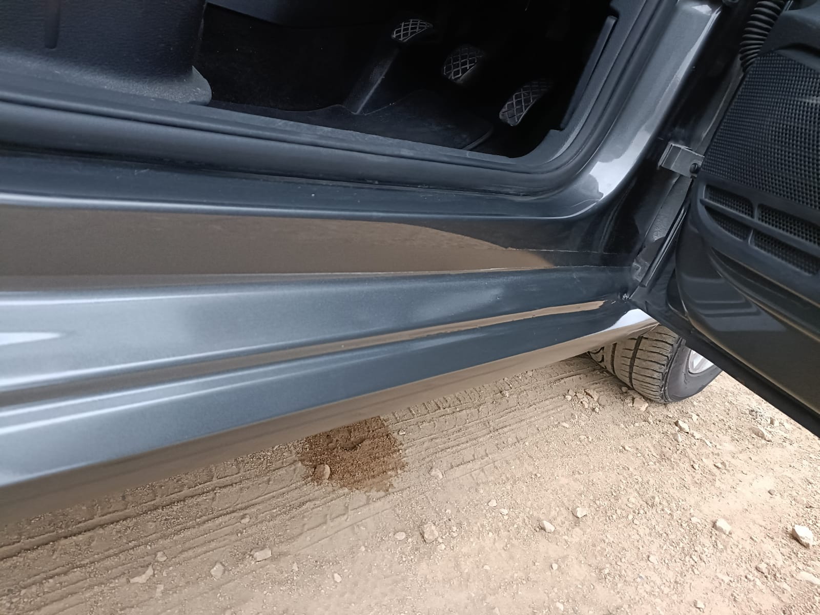 Sill area before repair — grey van