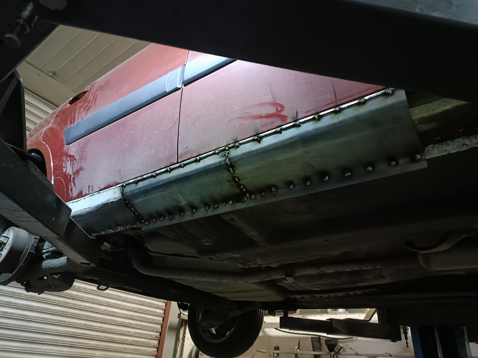 New steel panels welded into underbody