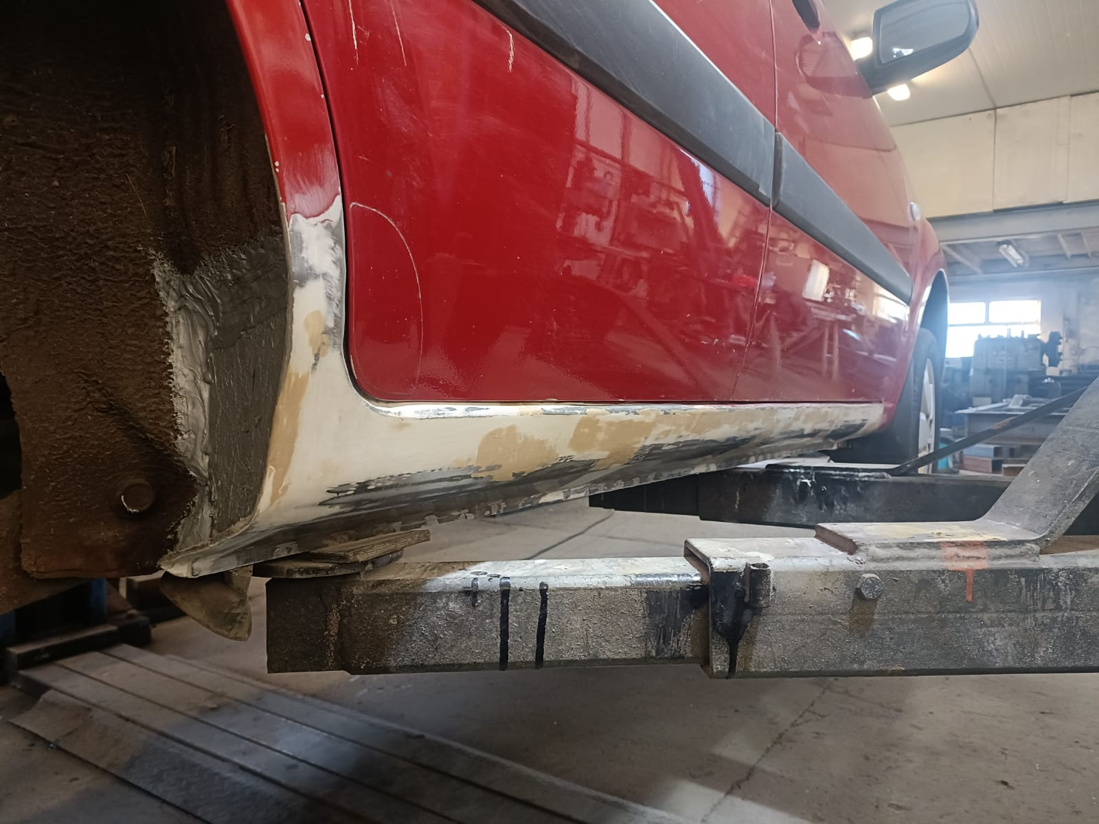 After — Major Underbody Rust Repair — Red Hatchback